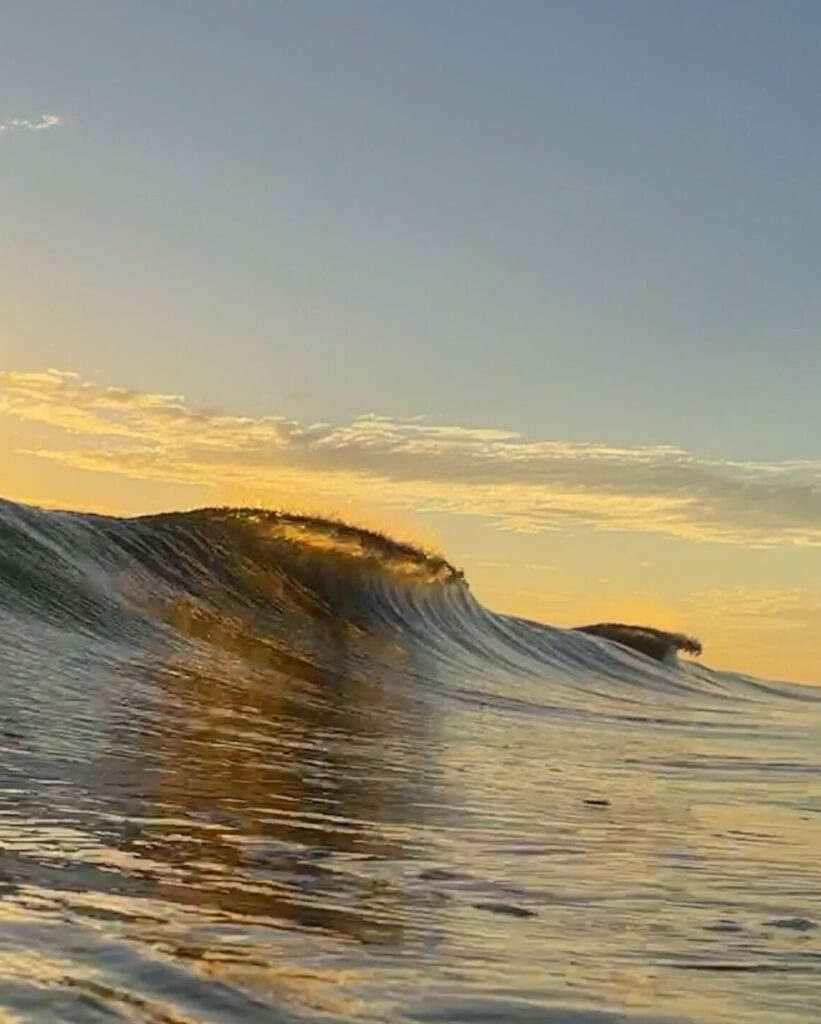 sunrise wave cresting